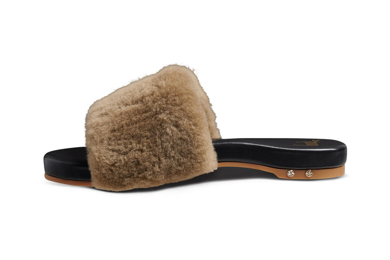 Baza Shearling slide sandal in bronze/black - product side shot