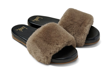 Baza Shearling slide sandal in bronze/black - product angle shot