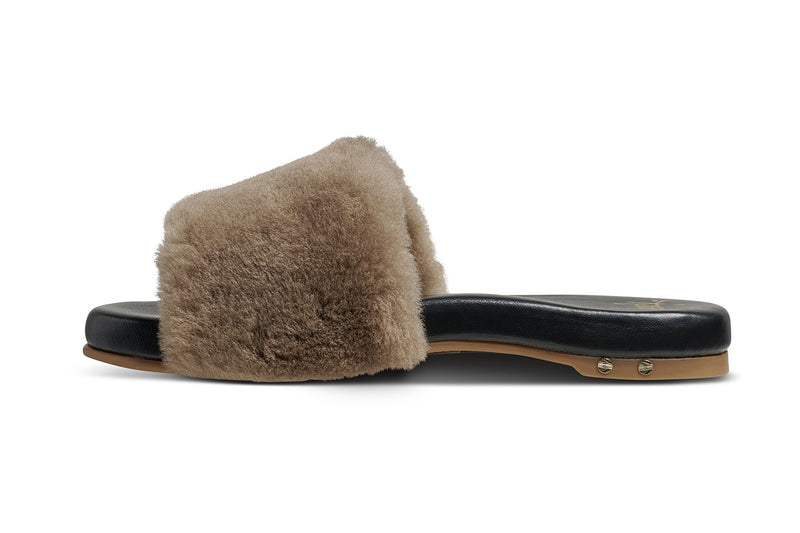 Baza Shearling slide sandal in bronze/black - product side shot