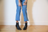 Woman wearing Catbird leather boot in black with jeans