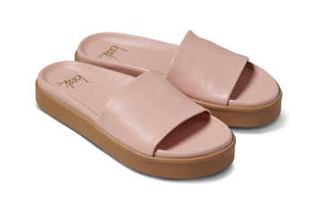 Chick leather platform slide sandals in blush - product angle shot