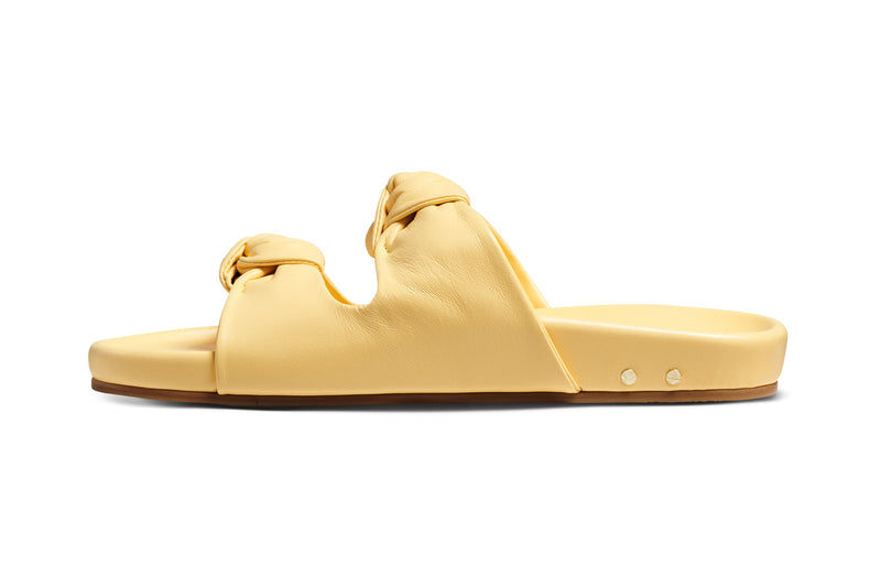 Coquette leather slide sandal in glow - product side shot