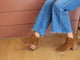 Woman wearing Eagle suede boots in chestnut with jeans and sweater