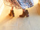 Woman wearing Eagle suede boots in chestnut with floral dress