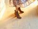 Woman wearing Eagle suede boots in chestnut with floral dress