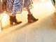 Woman wearing Eagle suede boots in chestnut with floral dress