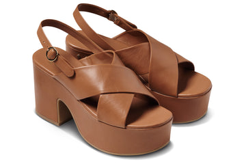 Emu leather platform heel buckle sandal in tan - product angle shot