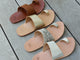 Group shot of Finch leather toe-ring sandals in tan, platinum/honey, snake/beach, and silver/beach