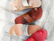 Group shot of Finch leather toe-ring sandals in tan, platinum/honey, and snake/beach