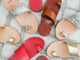 Group shot of Finch leather toe-ring sandals in tan, platinum/honey, and snake/beach