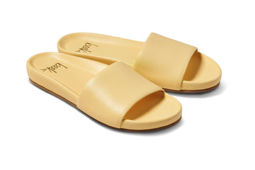 Gallito leather slide sandal in glow - product angle shot