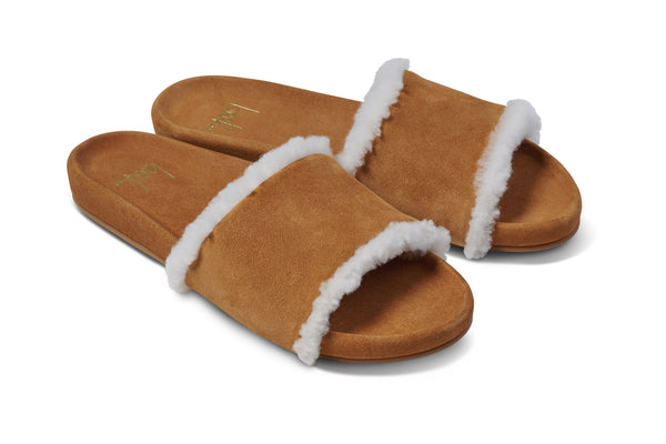 Gallito Shearling suede slide sandals in almond - product angle shot