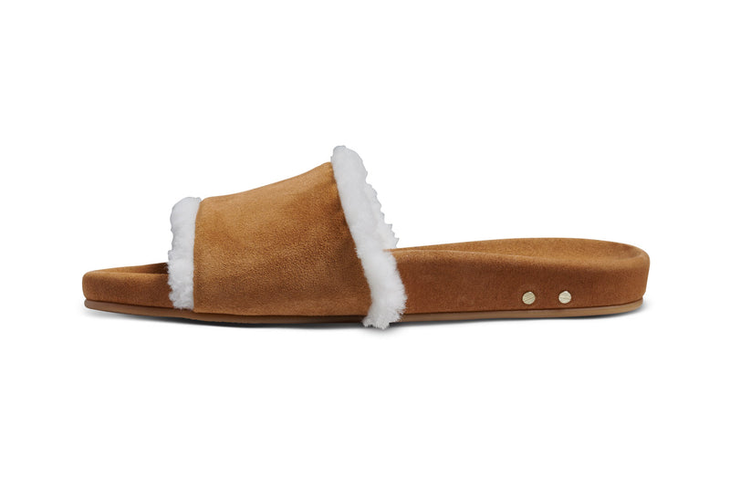 Gallito Shearling suede slide sandals in almond - product side shot