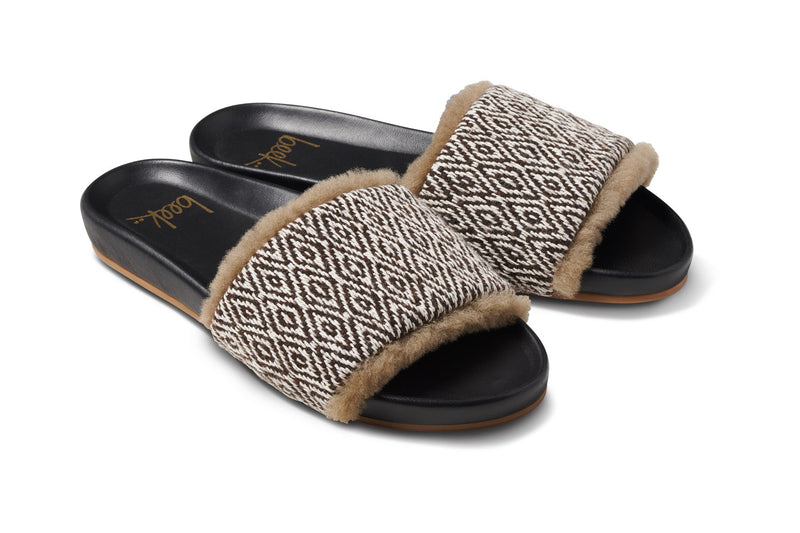 Gallito Shearling leather slide sandals in multi/black - product angle shot