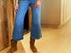 Woman wearing Grouse slouchy leather boot in chestnut with jeans