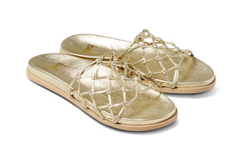 Harpy leather slide sandal in gold - product angle shot