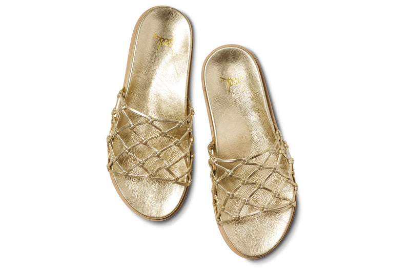 Harpy leather slide sandal in gold - product top shot