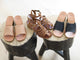 Group shot of Heron leather ankle strap block heel sandal in tan with Emerald leather block heel sandals in honey and black.