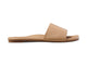 Honeybird leather slide sandals in beach - outer side shot