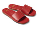 Honeybird leather slide sandals in red - angle shot 