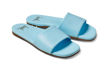 Honeybird leather slide sandal in sky - product angle shot