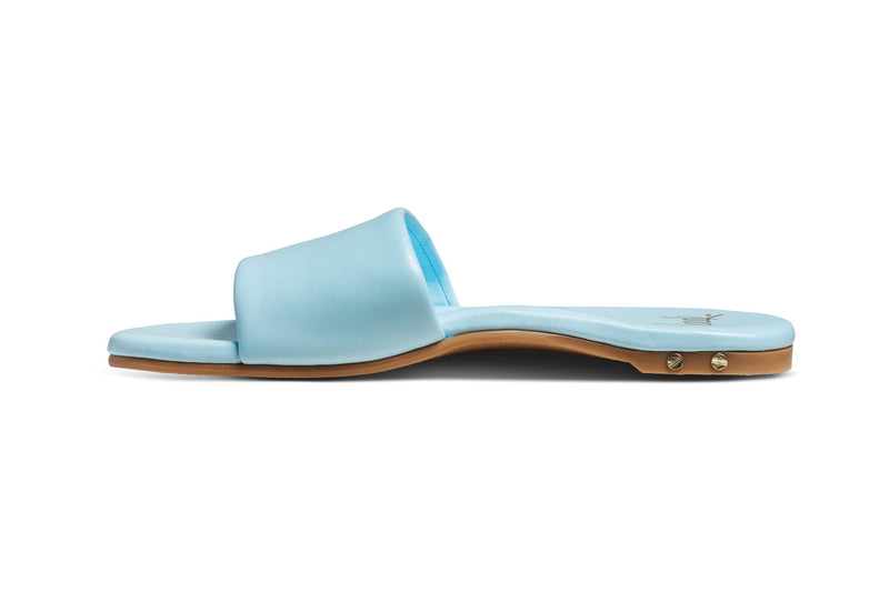 Honeybird leather slide sandal in sky - product side shot