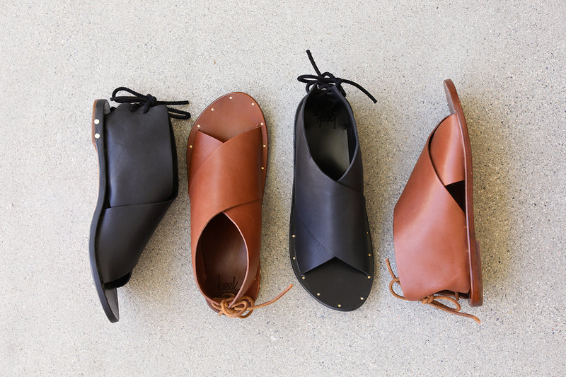 Group shot of Loon leather ankle tie sandal in black ande tan