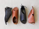 Group shot of Loon leather ankle tie sandal in black ande tan