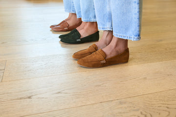 Women wearing Moorhen suede loafers in caramel, moss, and tan leather.