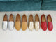 Group shot of Moorhen leather loafers in silver, honey, gold, and lipstick.