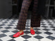 Woman wearing Moorhen leather loafers in lipstick with plaid pants