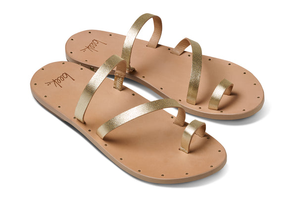 Nene leather slide sandals in platinum/beach - product angle shot