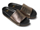 Pelican leather platform sandal in bronze/black - angle shot