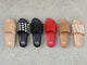 Group shot of Pelican leather slide sandals in honey and lipstick with Pelican Jute slide sandals in black and beach and Pelican Woven slide sandals in eggshell/black and eggshell/beach.