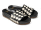 Pelican Woven leather slide sandal in eggshell/black - product angle shot