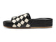 Pelican Woven leather slide sandal in eggshell/black - product side shot