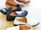 Group shot of Pepper leather loafer in eggshell, cognac, and black