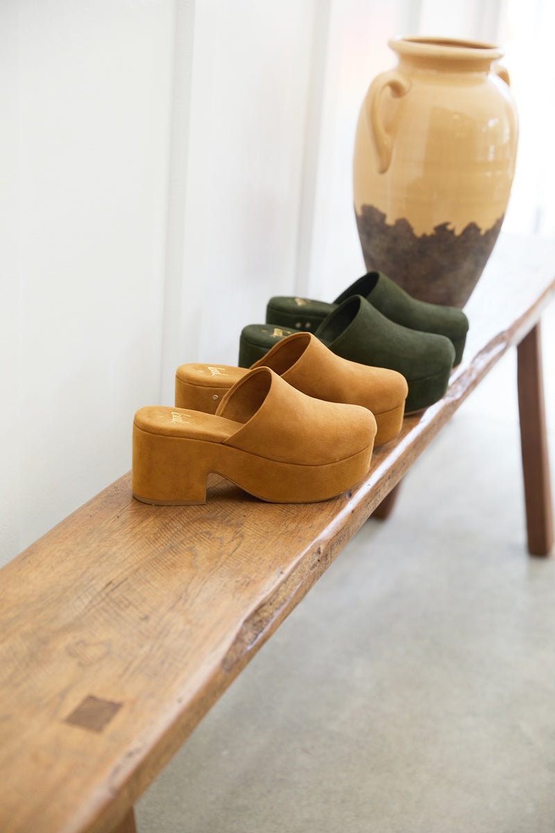 Group shot of Petrel suede platform heel in caramel and moss