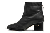 Pheasant leather boot in black - product side shot