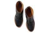 Pheasant leather boots in black/tan - product top shot