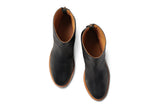 Pheasant leather boots in black/tan - product top shot