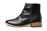 Quail leather boots in black - product side shot outside