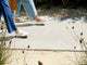 Women wearing Sandpiper sneakers in leopard and white with jeans