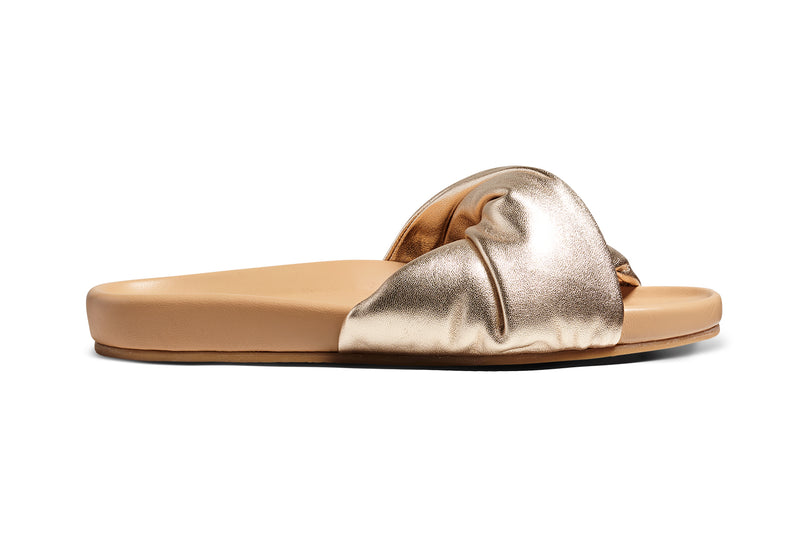 Tesia leather slide sandal in gold/beach - product outer side shot