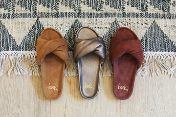 Group shot of Tesia slide sandal in almond suede, mocha leather, fig suede.