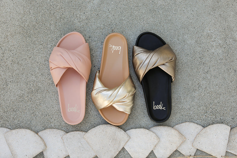 Group shot of Tesia leather slide sandal in blush, gold/beach, bronze/black