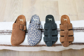 Group shot of Tody suede slide sandal in chestnut  and moss, Vulture suede slide in leopard and chestnut