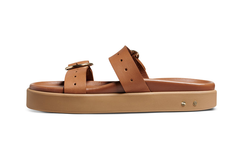 Warbler leather slide sandal in tan - product side shot